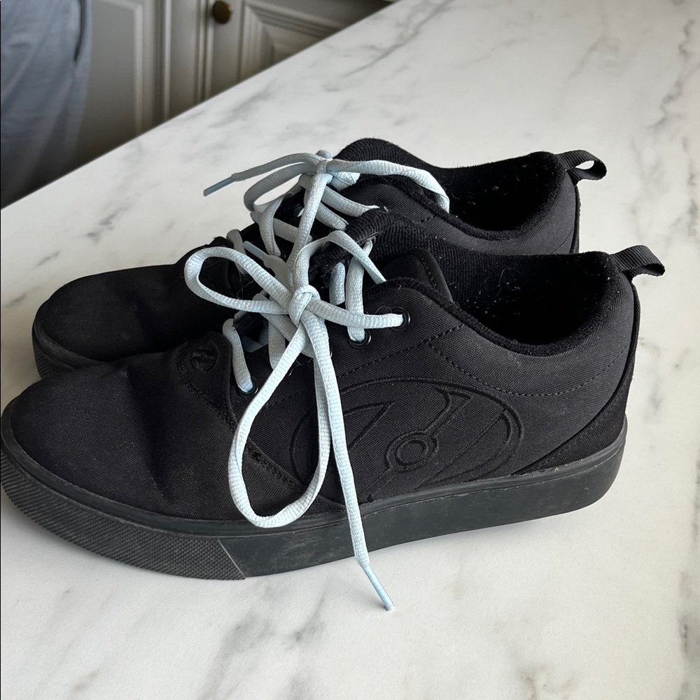 Black Heelys with Light Blue Laces